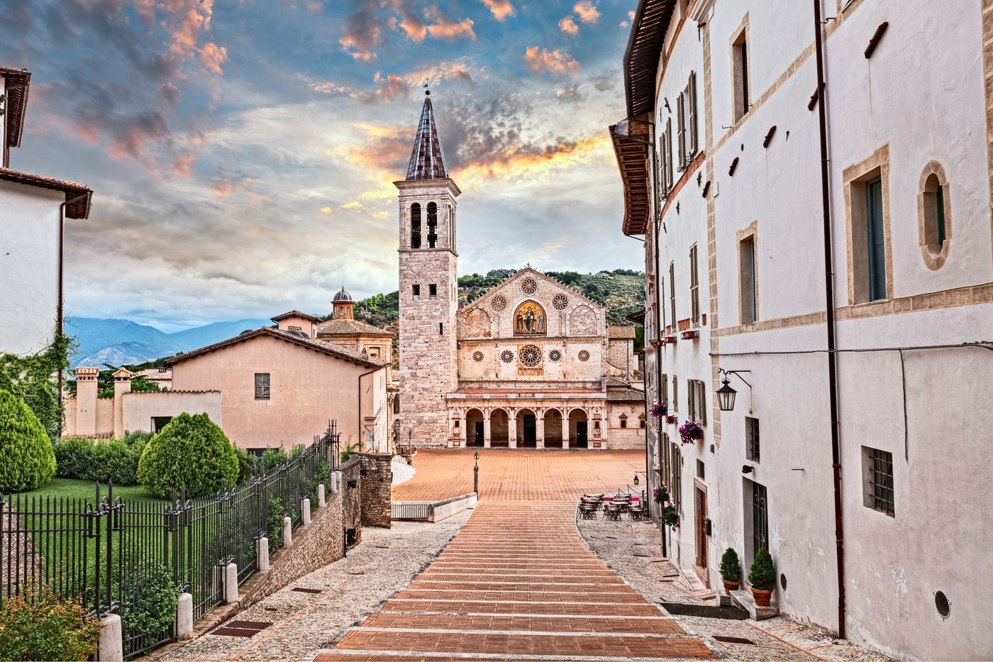The broad stone steps descending to Spoleto Cathedral and its bell tower